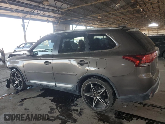 2017 Mitsubishi Outlander GT z VIN JA4JZ4AX4HZ013235, wystawiony jako Copart lot #74299434 z przebiegiem 103 738 mil mil oraz Szkoda całkowita • Salvage title. Historia ofert i sprzedaży dostępna na DreamBid. Obrazek 2.