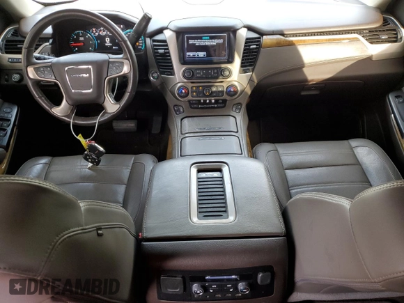 2017 GMC Yukon Denali with VIN 1GKS1CKJ8HR218700, listed as a Copart auction lot 88451155 with 112,348 mi miles and Salvage Title. Bid and sale history available at carsss.com. Image 8.