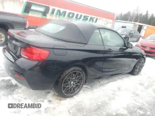 2018 BMW 2 Series 230i xDrive with VIN WBA2K1C56JVD41570, listed as a Copart auction lot 84181764 with 77,231 mi miles and Salvage Title. Bid and sale history available at carsss.com. Image 3.