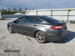 2016 Ford Fusion SE Hybrid with VIN 3FA6P0LUXGR131599, listed as a Copart auction lot 54498685 with 160,379 mi miles and Salvage title. Bid and sale history available at DreamBid. Image 2.