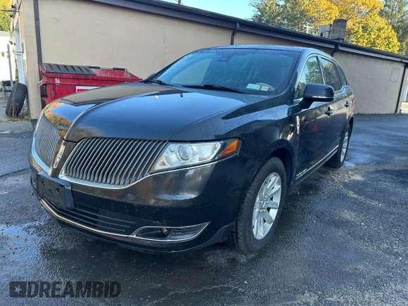 2015 Lincoln MKT with VIN 2LMHJ5NK0FBL03293, listed as a Copart auction lot 77810284 with 115,725 mi miles and Clean Title. Bid and sale history available at DreamBid. Image 2.