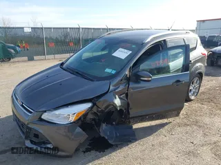 2015 Ford Escape Titanium with VIN 1FMCU9J90FUB58306, listed as a IAAI auction lot 41815151 with 136,835 mi miles. Bid and sale history available at carsss.com. Image 2.
