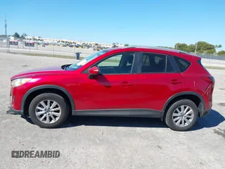 2015 Mazda CX-5 Touring with VIN JM3KE2CY5F0542184, listed as a IAAI auction lot 41770264 with 119,592 mi miles. Bid and sale history available at carsss.com. Image 14.