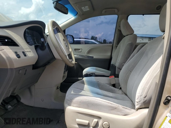 2014 Toyota Sienna LE AAS with VIN 5TDKK3DC4ES412399, listed as a Copart auction lot 65276625 with 264,283 mi miles and Clean title. Bid and sale history available at DreamBid. Image 7.