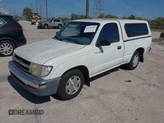 1998 Toyota Tacoma with VIN 4TANL42N2WZ022014, listed as a IAAI auction lot 41721566 with 175,566 mi miles. Bid and sale history available at carsss.com. Image 2.