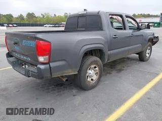 2017 Toyota Tacoma SR with VIN 5TFAX5GN7HX090832, listed as a IAAI auction lot 41903374 with 234,499 mi miles. Bid and sale history available at carsss.com. Image 4.