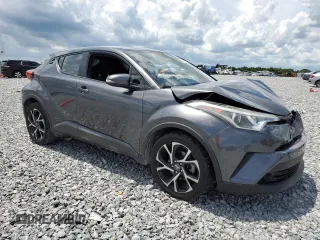 2018 Toyota C-HR XLE with VIN NMTKHMBX7JR000609, listed as a Copart auction lot 61997655 with 100,062 mi miles and Salvage title. Bid and sale history available at DreamBid. Image 4.