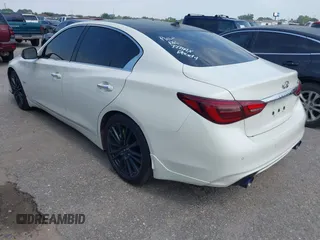 2019 Infiniti Q50 Luxe with VIN JN1EV7AP4KM510863, listed as a IAAI auction lot 42251042 with 54,156 mi miles and . Bid and sale history available at DreamBid. Image 3.