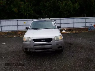 2001 Ford Escape XLT with VIN 1FMYU04181KC55393, listed as a Copart auction lot 76321074 with 223,327 mi miles and Salvage Title. Bid and sale history available at carsss.com. Image 12.