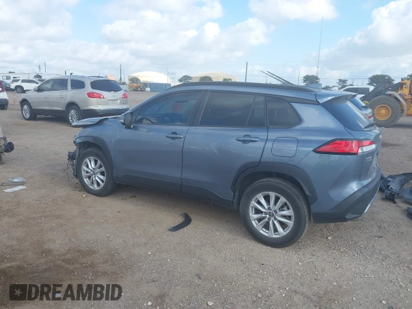 2022 Toyota Corolla Cross LE with VIN 7MUCAAAG0NV018245, listed as a IAAI auction lot 42039762 with 26,690 mi miles and . Bid and sale history available at DreamBid. Image 3.