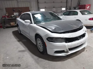 2015 Dodge Charger SXT with VIN 2C3CDXJG9FH785729, listed as a IAAI auction lot 41802261 with 145,974 mi miles. Bid and sale history available at carsss.com. Image 1.
