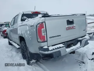 2015 GMC Canyon 4WD SLT with VIN 1GTG6CE36F1257975, listed as a IAAI auction lot 41607688 with 127,523 mi miles. Bid and sale history available at carsss.com. Image 3.