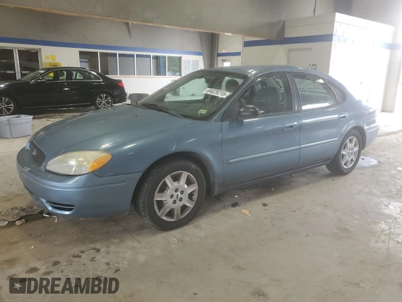 2007 Ford Taurus SE with VIN 1FAFP53U17A215432, listed as a Copart auction lot 64029215 with 121,190 mi miles and Salvage title. Bid and sale history available at DreamBid. Image 1.