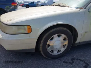 2001 Cadillac Seville Luxury SLS z VIN 1G6KS54Y81U110047, wystawiony jako IAAI lot #42436746 z przebiegiem 107 360 mil mil oraz . Historia ofert i sprzedaży dostępna na DreamBid. Obrazek 6.