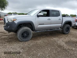 2018 Toyota Tacoma SR z VIN 3TMCZ5AN9JM178420, wystawiony jako Copart lot #56401835 z przebiegiem 117 430 mil mil oraz Czysty tytuł • Clean title. Historia ofert i sprzedaży dostępna na DreamBid. Obrazek 1.