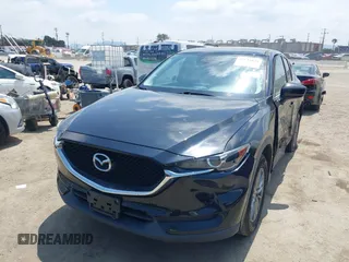 2017 Mazda CX-5 Touring with VIN JM3KFACL0H0124632, listed as a IAAI auction lot 42134971 with 107,029 mi miles and . Bid and sale history available at carsss.com. Image 17.