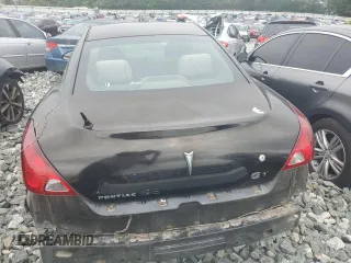 2006 Pontiac G6 GT z VIN 1G2ZH158864139383, wystawiony jako Copart lot #57875795 z przebiegiem 241 750 mil mil oraz Szkoda całkowita • Salvage title. Historia ofert i sprzedaży dostępna na DreamBid. Obrazek 6.