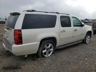 2012 Chevrolet Suburban LTZ with VIN 1GNSCKE02CR199645, listed as a Copart auction lot 47209145 with 128,454 mi miles and Salvage Title. Bid and sale history available at carsss.com. Image 3.