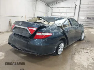 2016 Toyota Camry XLE with VIN 4T4BF1FK6GR561765, listed as a IAAI auction lot 42217107 with 36,599 mi miles and . Bid and sale history available at DreamBid. Image 4.