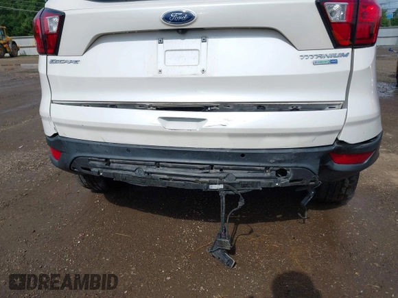2019 Ford Escape Titanium with VIN 1FMCU9J98KUA95238, listed as a IAAI auction lot 42525324 with 59,222 mi miles and . Bid and sale history available at DreamBid. Image 6.