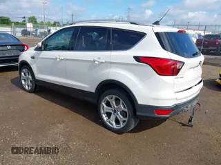 2019 Ford Escape Titanium with VIN 1FMCU9J98KUA95238, listed as a IAAI auction lot 42525324 with 59,222 mi miles and . Bid and sale history available at DreamBid. Image 3.