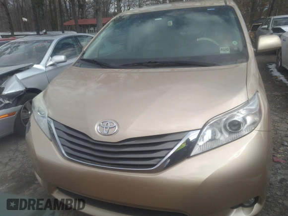 2011 Toyota Sienna XLE with VIN 5TDDK3DC3BS029476, listed as a IAAI auction lot 41393568 with 124,328 mi miles. Bid and sale history available at carsss.com. Image 12.