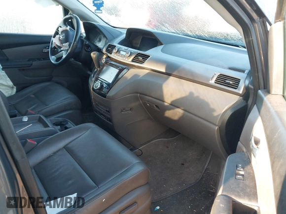 2016 Honda Odyssey EX-L with VIN 5FNRL5H60GB074826, listed as a IAAI auction lot 41733197 with Not Provided miles and . Bid and sale history available at DreamBid. Image 5.