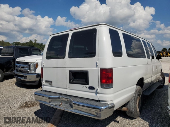 2009 Ford Econoline Passenger XL with VIN 1FBSS31L99DA06824, listed as a Copart auction lot 73740824 with 147,528 mi miles and Salvage title. Bid and sale history available at DreamBid. Image 3.