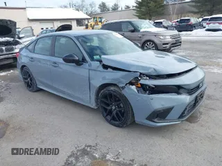2023 Honda Civic Sport z VIN 2HGFE2F58PH517791, wystawiony jako IAAI lot #41638573 z przebiegiem 22 420 mil mil oraz . Historia ofert i sprzedaży dostępna na DreamBid. Obrazek 1.