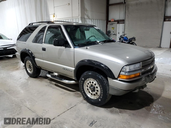 2000 Chevrolet Blazer LS z VIN 1GNCT18W9YK188091, wystawiony jako Copart lot #78592844 z przebiegiem 69 497 mil mil oraz Szkoda całkowita • Salvage title. Historia ofert i sprzedaży dostępna na DreamBid. Obrazek 4.