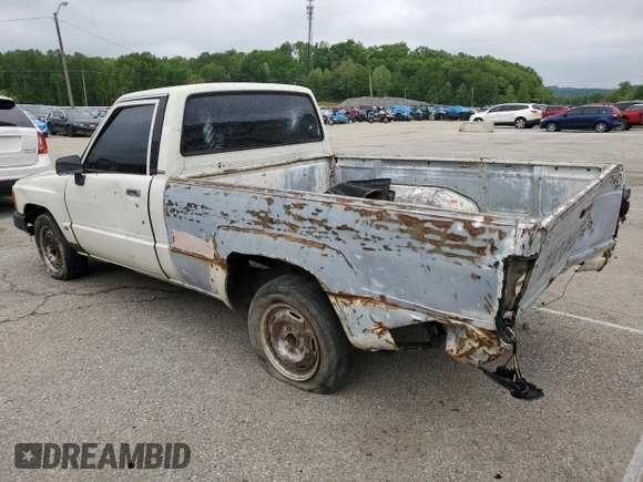 1988 Toyota Pickup z VIN JT4RN50R0J5122639, wystawiony jako Copart lot #52792445 z przebiegiem 233 407 mil mil oraz Szkody całkowita. Historia ofert i sprzedaży dostępna na DreamBid. Obrazek 2.