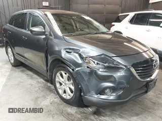2013 Mazda CX-9 Touring z VIN JM3TB3CV0D0415199, wystawiony jako IAAI lot #42029040 z przebiegiem 154 404 mil mil oraz . Historia ofert i sprzedaży dostępna na DreamBid. Obrazek 6.