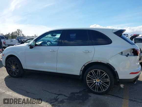 2017 Porsche Cayenne with VIN WP1AA2A23HKA80695, listed as a IAAI auction lot 41532359 with 71,628 mi miles. Bid and sale history available at carsss.com. Image 15.