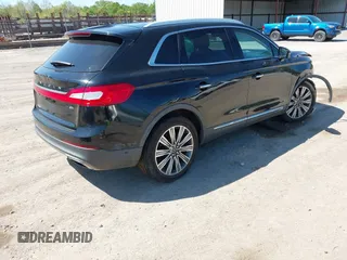 2016 Lincoln MKX Black Label with VIN 2LMPJ9JP1GBL55716, listed as a IAAI auction lot 42002075 with 85,200 mi miles. Bid and sale history available at carsss.com. Image 4.