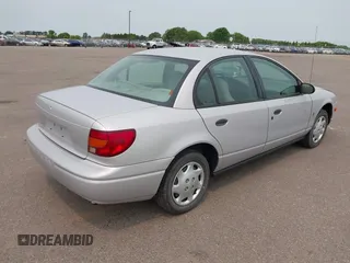 2001 Saturn SL z VIN 1G8ZH52861Z320057, wystawiony jako IAAI lot #42402681 z przebiegiem 111 375 mil mil oraz . Historia ofert i sprzedaży dostępna na DreamBid. Obrazek 4.