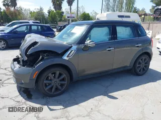 2012 MINI Countryman S with VIN WMWZC3C53CWL83664, listed as a IAAI auction lot 42062673 with 102,615 mi miles and . Bid and sale history available at DreamBid. Image 2.
