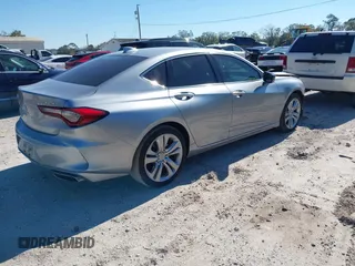 2021 Acura TLX Technology with VIN 19UUB5F4XMA009079, listed as a IAAI auction lot 41271138 with 67,761 mi miles and . Bid and sale history available at DreamBid. Image 4.