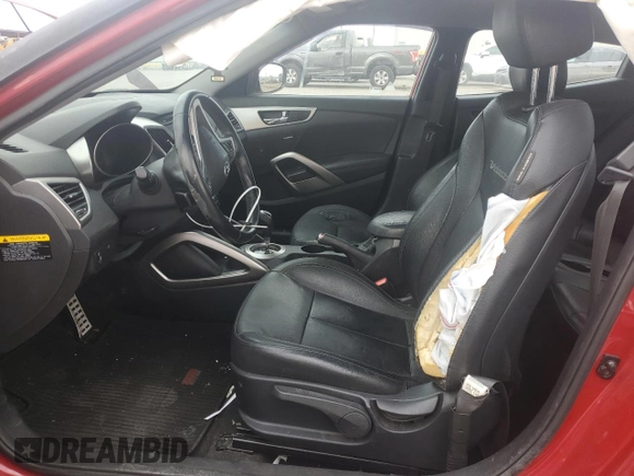 2014 Hyundai Veloster RE:FLEX z VIN KMHTC6AD3EU212525, wystawiony jako Copart lot #52935475 z przebiegiem 54 086 mil mil oraz Szkoda całkowita • Salvage title. Historia ofert i sprzedaży dostępna na DreamBid. Obrazek 7.
