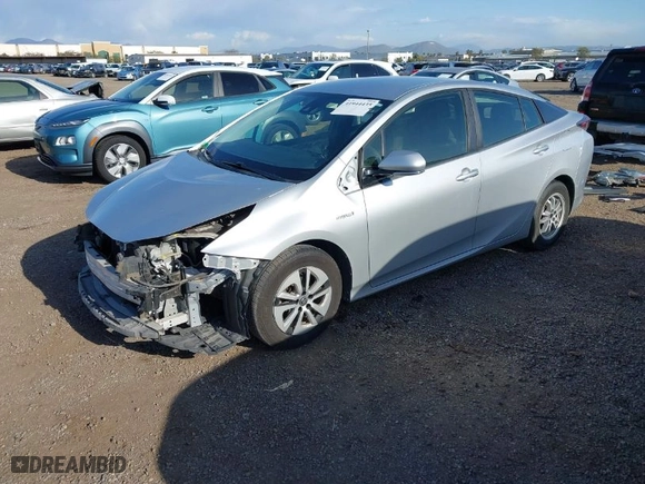 2018 Toyota Prius Two with VIN JTDKBRFUXJ3070977, listed as a IAAI auction lot 41944435 with 128,117 mi miles. Bid and sale history available at carsss.com. Image 2.