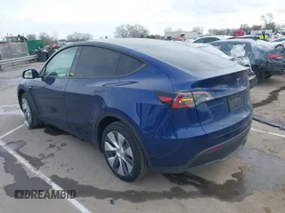 2024 Tesla Model Y Long Range z VIN 7SAYGDEE9RA244657, wystawiony jako IAAI lot #41694621 z przebiegiem 12 991 mil mil oraz . Historia ofert i sprzedaży dostępna na DreamBid. Obrazek 3.