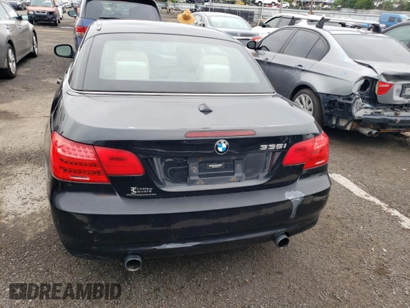 2012 BMW 3 Series 335i with VIN WBADX7C5XCE744190, listed as a Copart auction lot 63581925 with 103,834 mi miles and Clean title. Bid and sale history available at DreamBid. Image 6.