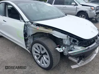 2023 Tesla Model 3 z VIN 5YJ3E1EA9PF431356, wystawiony jako IAAI lot #42620155 z przebiegiem 101 626 mil mil oraz . Historia ofert i sprzedaży dostępna na DreamBid. Obrazek 6.