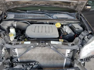 2015 Dodge Grand Caravan SXT with VIN 2C4RDGCG5FR632388, listed as a Copart auction lot 54719625 with 67,996 mi miles and Salvage Title. Bid and sale history available at DreamBid. Image 12.