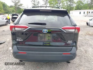 2021 Toyota RAV4 Hybrid XLE with VIN JTMRWRFV2MD133113, listed as a IAAI auction lot 42087394 with 103,019 mi miles and . Bid and sale history available at DreamBid. Image 16.