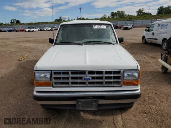 1992 Ford Ranger XLT with VIN 1FTCR15X9NPA98555, listed as a Copart auction lot 57470934 with 104,247 mi miles and Clean Title. Bid and sale history available at DreamBid. Image 5.