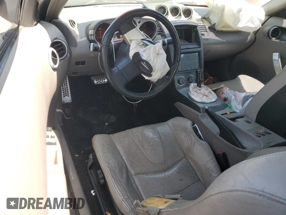 2003 Nissan 350Z Touring z VIN JN1AZ34E63T016212, wystawiony jako Copart lot #53799605 z przebiegiem 176 292 mil mil oraz Czysty tytuł • Clean title. Historia ofert i sprzedaży dostępna na DreamBid. Obrazek 8.