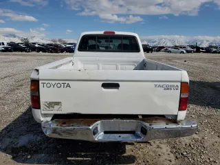 1999 Toyota Tacoma with VIN 4TAWN72N2XZ434256, listed as a Copart auction lot 49873685 with 285,424 mi miles and Salvage title. Bid and sale history available at DreamBid. Image 6.