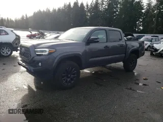 2022 Toyota Tacoma Limited with VIN 3TMGZ5AN2NM466075, listed as a Copart auction lot 85933694 with 40,606 mi miles and Salvage title. Bid and sale history available at DreamBid. Image 1.