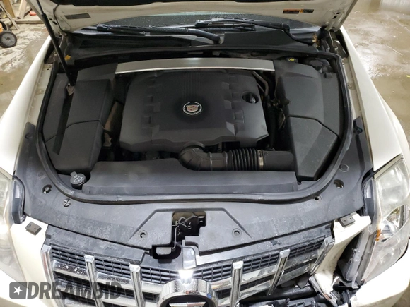 2012 Cadillac CTS Premium with VIN 1G6DS5E35C0120346, listed as a Copart auction lot 43354535 with 121,196 mi miles and Salvage Title. Bid and sale history available at DreamBid. Image 11.