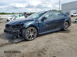 2019 Toyota Camry Hybrid LE z VIN 4T1B21HK2KU516222, wystawiony jako Copart lot #56294845 z przebiegiem 56 341 mil mil oraz Szkoda całkowita • Salvage title. Historia ofert i sprzedaży dostępna na DreamBid. Obrazek 1.